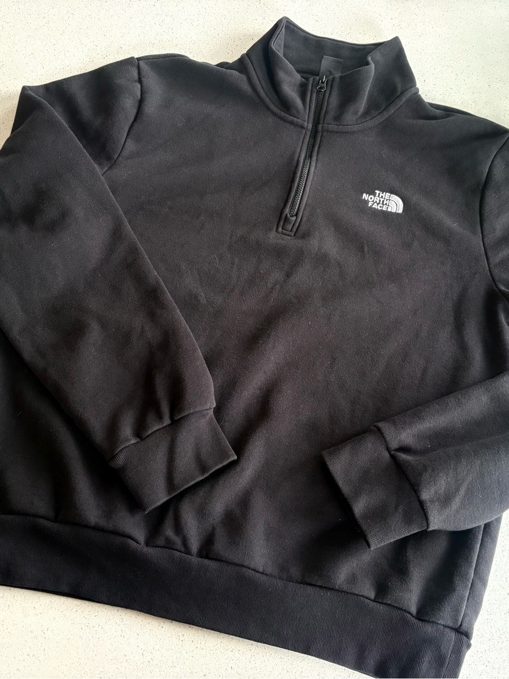 North Face men’s 1/4 zip black sweater